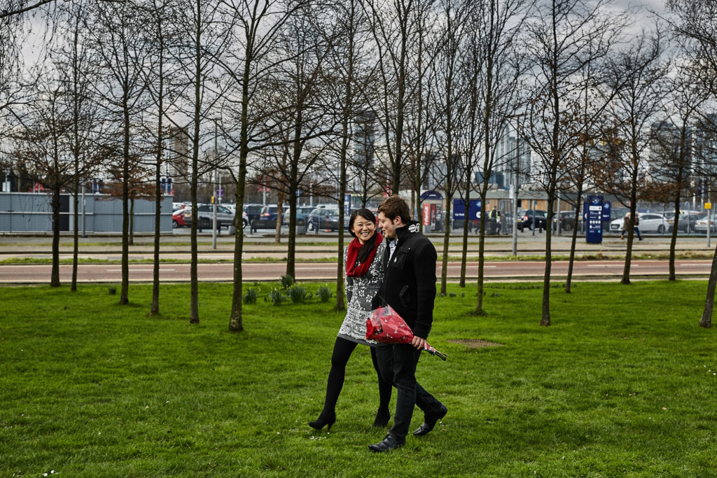 Man proposing to his girlfriend among the trees in a London park