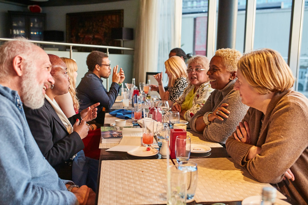 Guests seated along the table during the birthday lunch