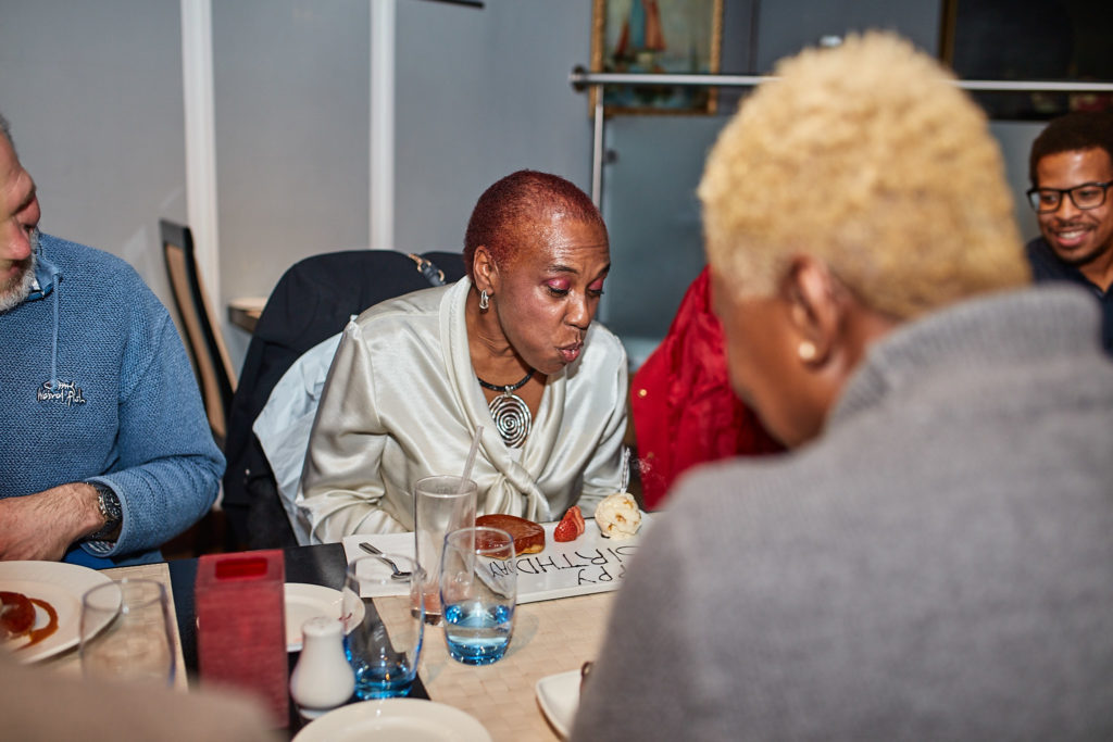 Guests talking across the table