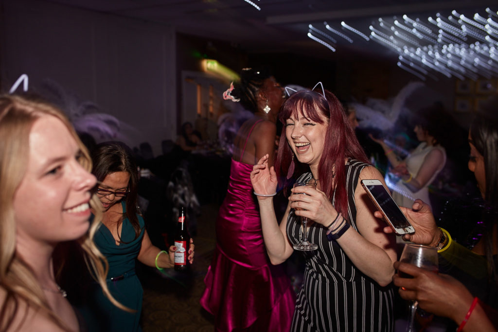 Guests chatting and laughing at the awards evening