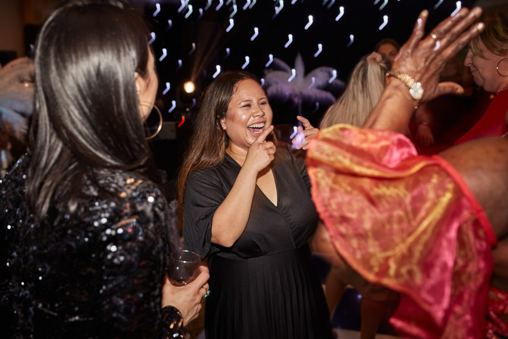 Guests dancing together on the dance floor