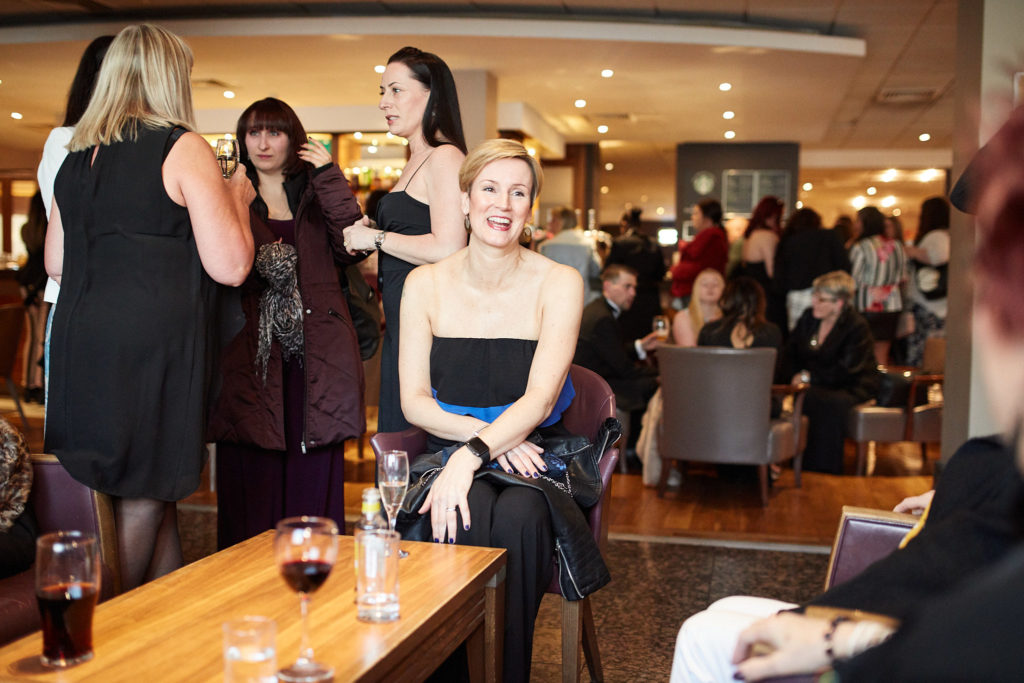 Guests chatting in the hotel bar before the awards evening