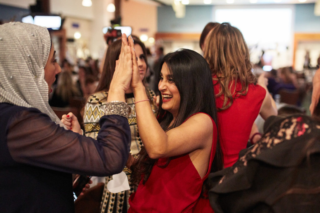 Guests taking a selfie at their table