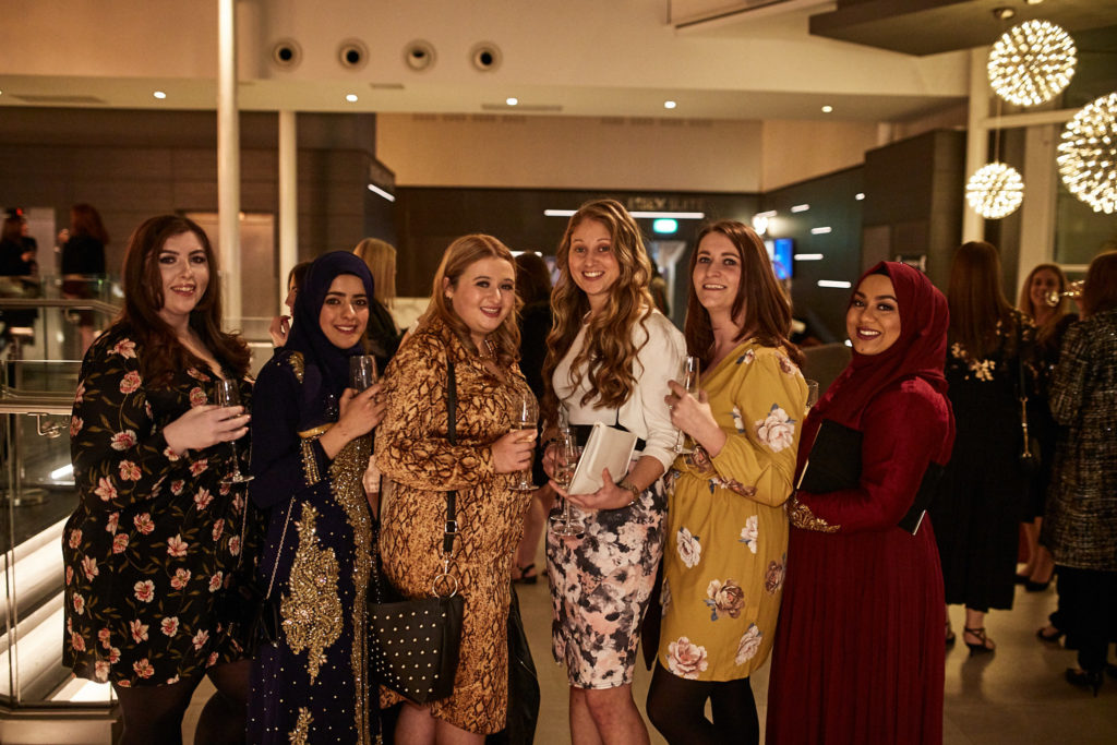 Group of guests posing together at the awards evening