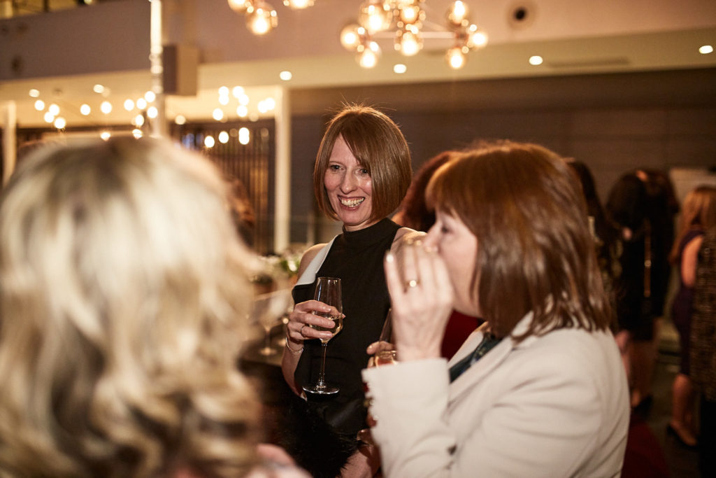 Guests chatting at the drinks reception