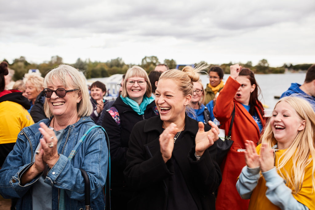 Spectators applauding at the prize-giving