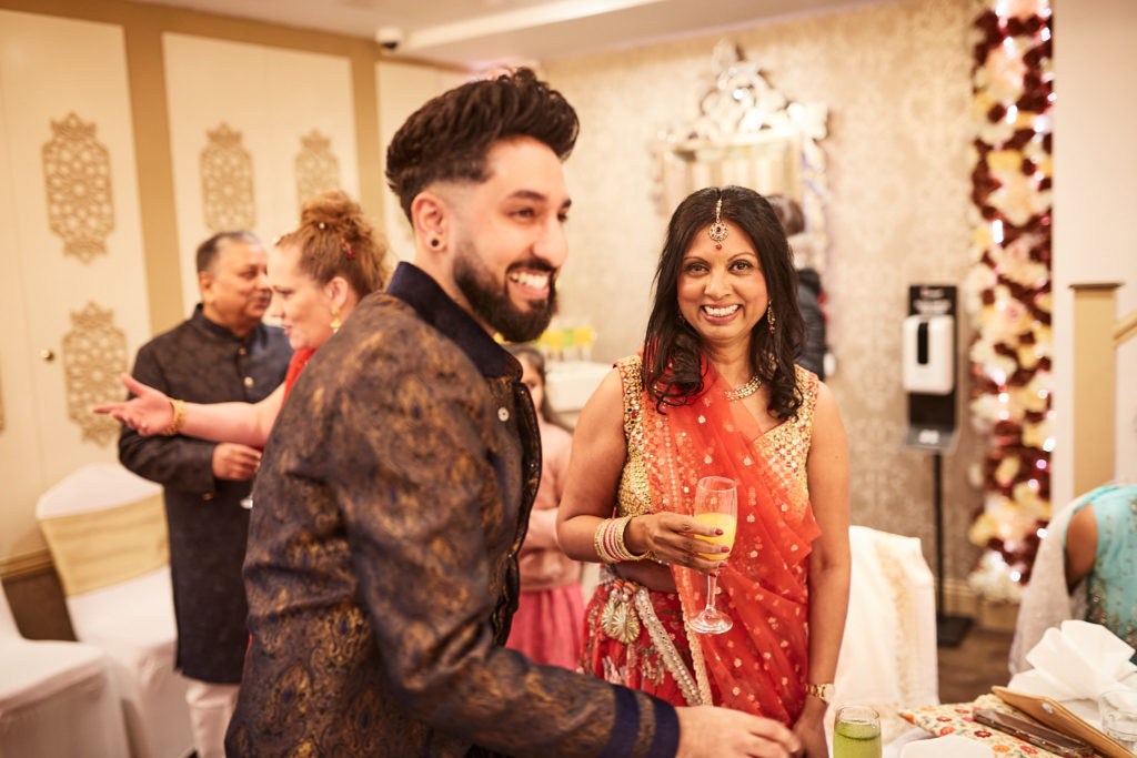 Guests laughing together in the banquet room