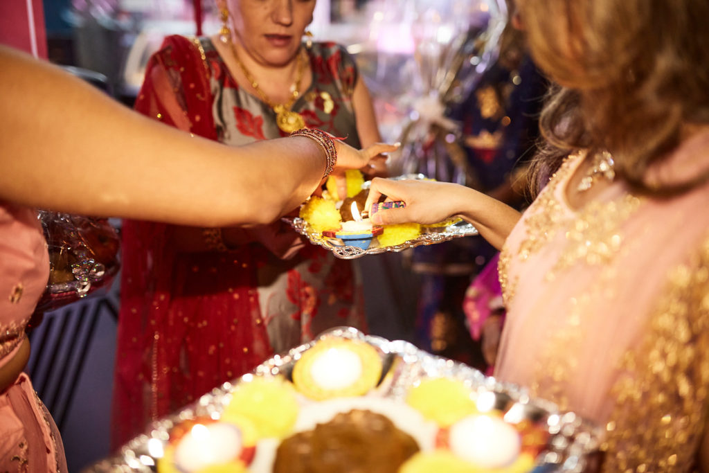 Tray of sweets being offered to guests