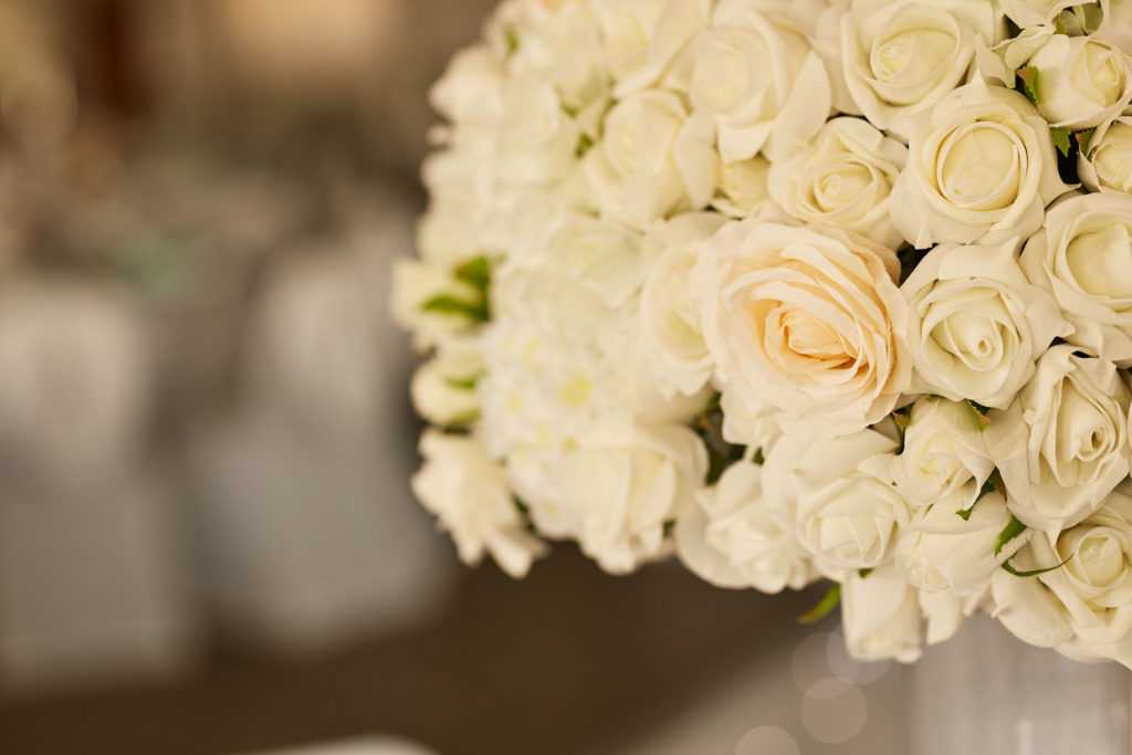 Close-up of a dome of cream roses in a table centrepiece