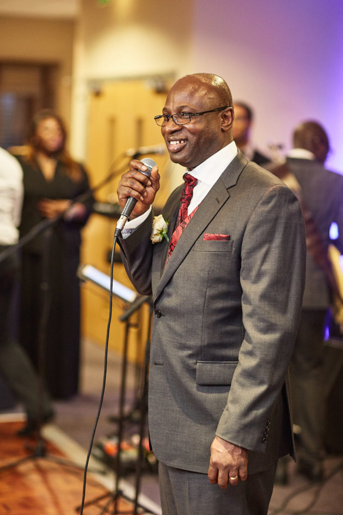Groom giving his speech with a microphone