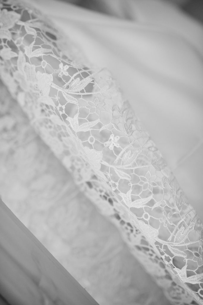 Black and white close-up of the lace edge of the veil
