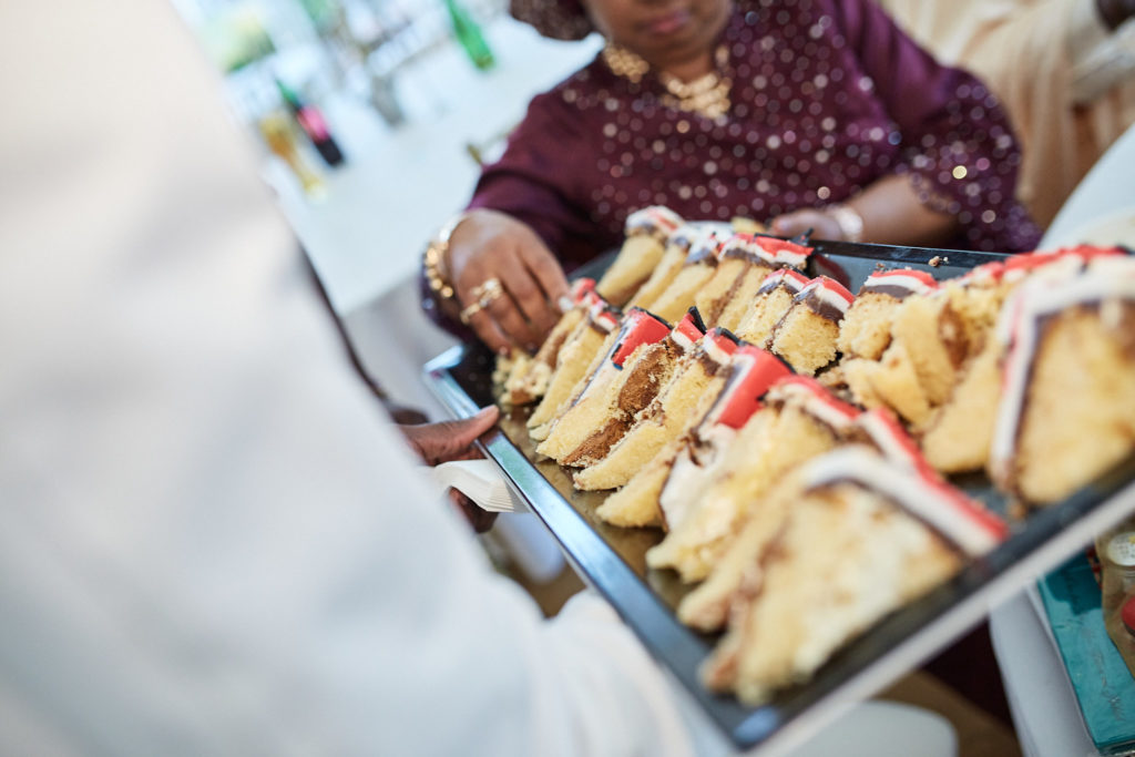 Guests helping themselves to sandwiches at the evening buffet