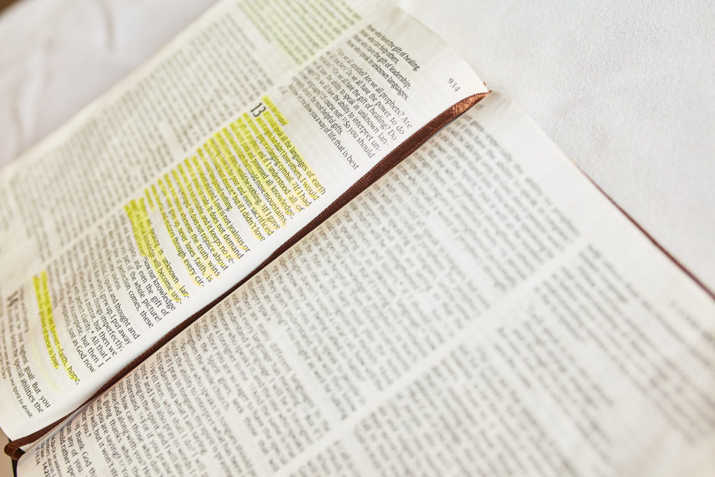 Open Bible with a passage highlighted in yellow