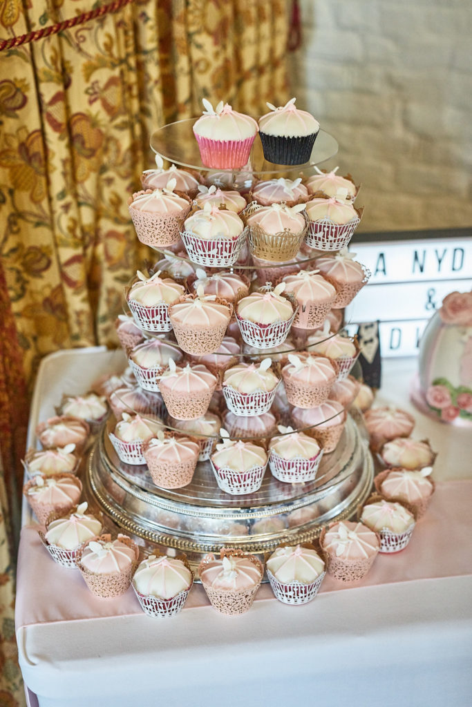 Tower of pink and white wedding cupcakes