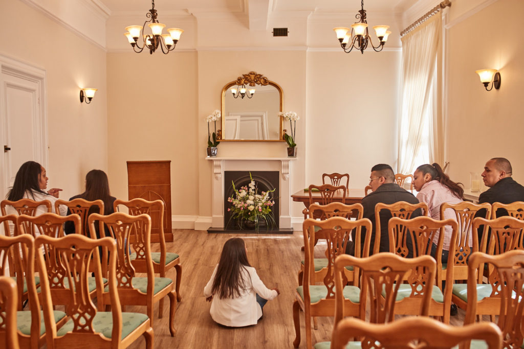 Guests seated in the ceremony room at Woolwich Town Hall before the wedding