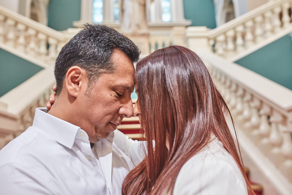 Close-up of the bride and groom forehead to forehead at Woolwich Town Hall