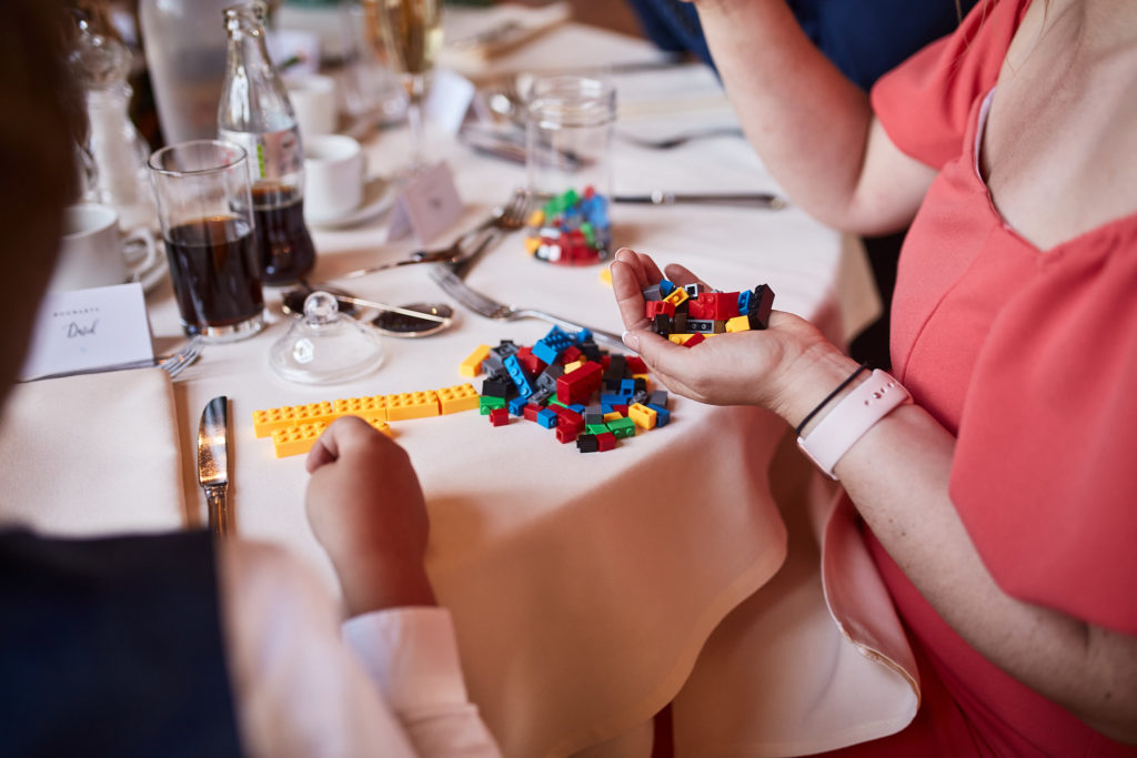 Children building with Lego at the wedding table