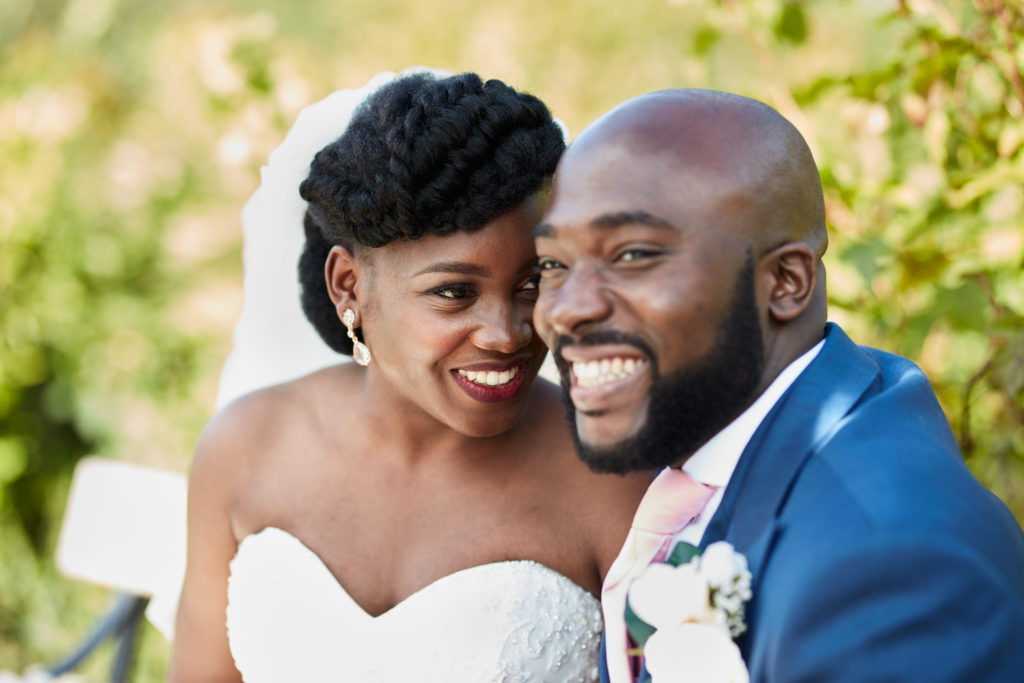 Close-up of the bride and groom smiling cheek to cheek at Forty Hall