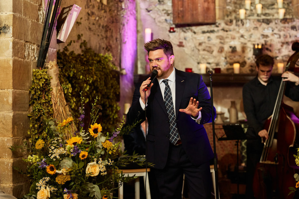 Singer performing with a double bass player