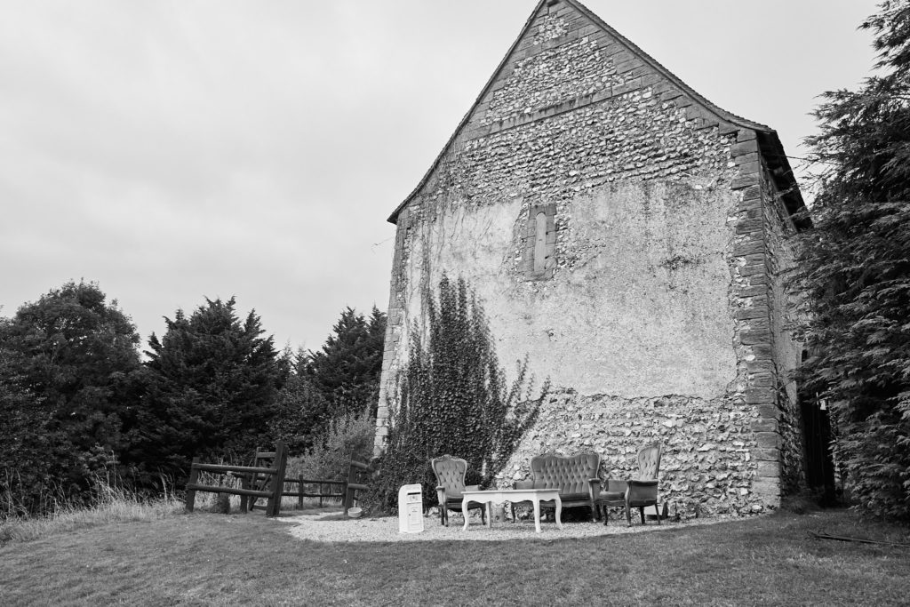 Black and white photo of the Norman church at the Lost Village of Dode, Kent