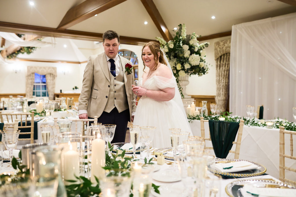 Bride and groom entering the reception room for their wedding breakfast