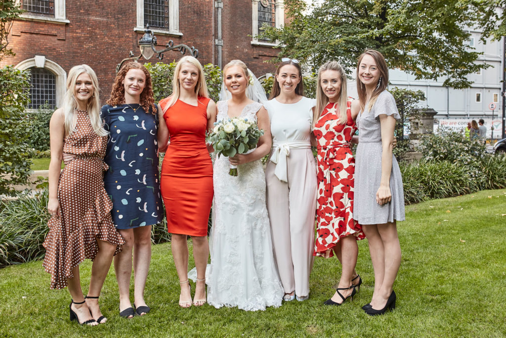 Bride with a group of friends in summer dresses