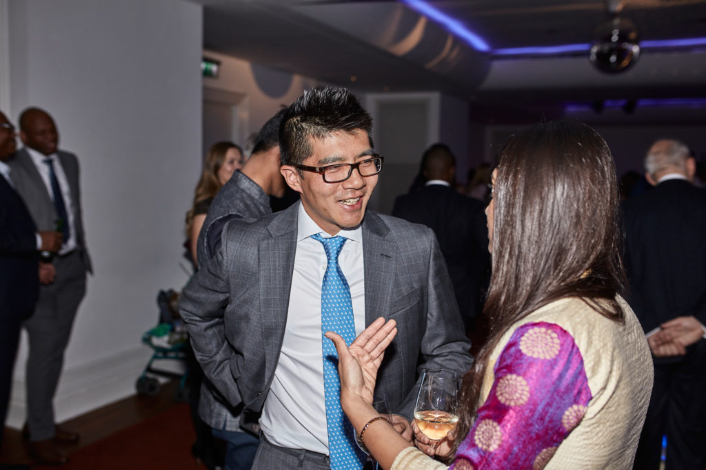 Wedding guests dancing at the evening reception