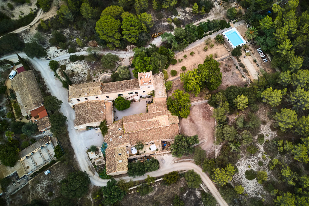 Aerial drone photo looking down on the buildings and pool at Son Boronat, Mallorca