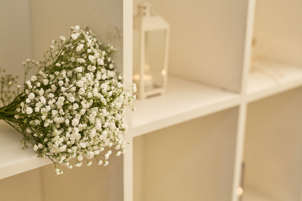 Bunch of gypsophila on white shelving