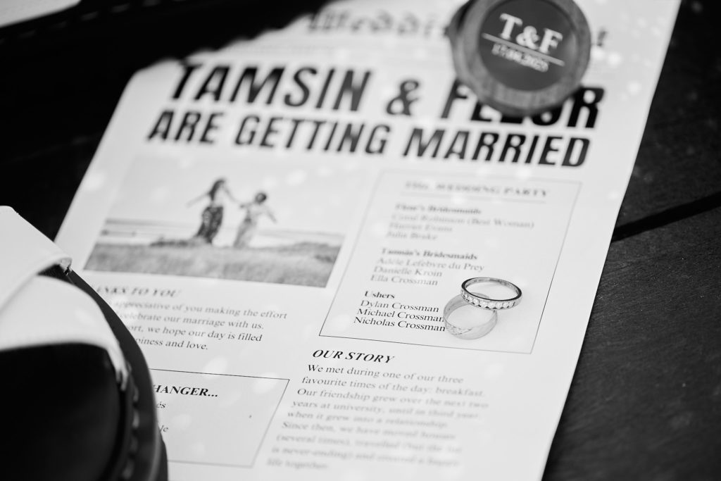 Black and white photo of a newspaper-style order of the day headed "Tamsin & Fleur are getting married"