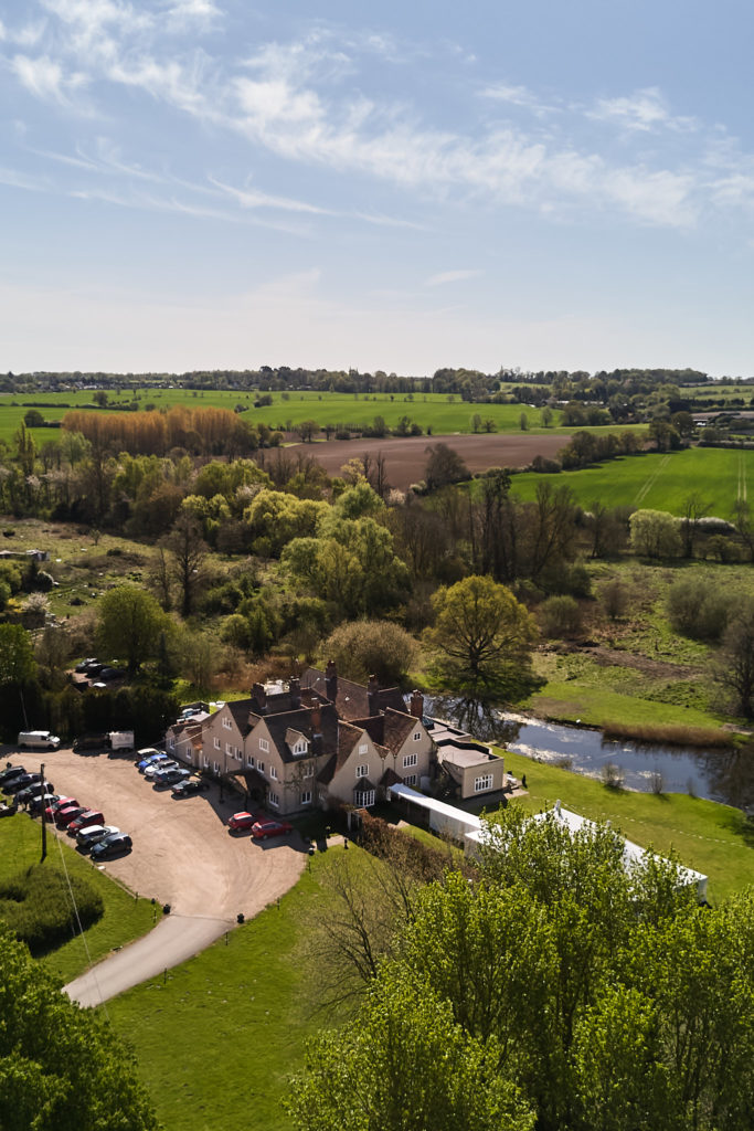 Aerial drone photo of Prested Hall and its grounds in the Essex countryside