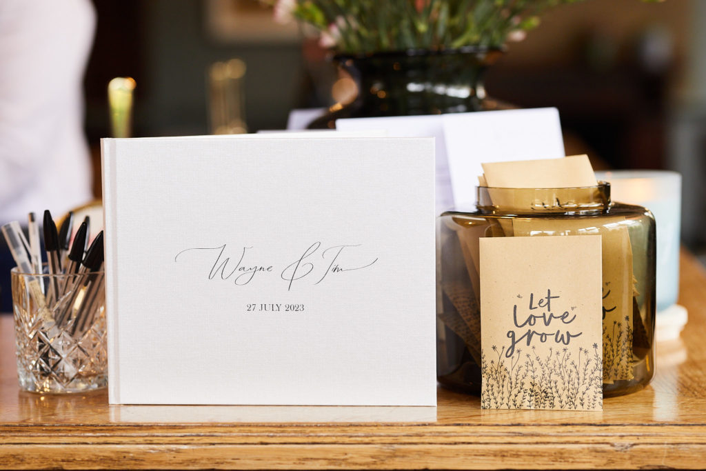 Wedding cards and a gift on a table