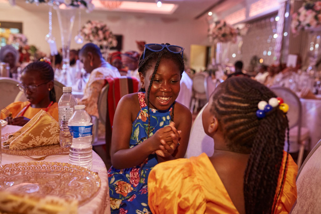 Young girls laughing together at the table