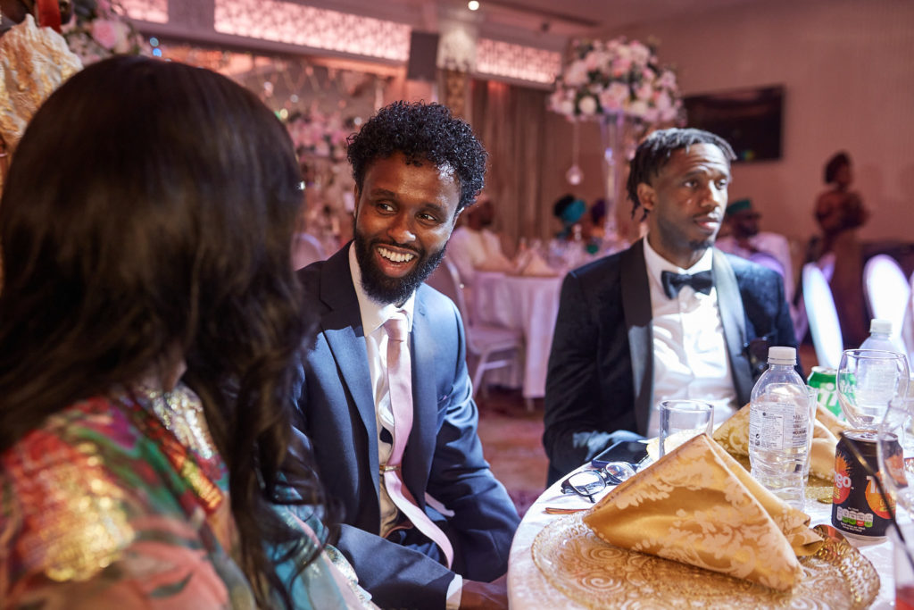 Wedding guests chatting at their table