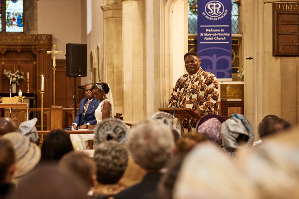 Speaker addressing the congregation from the pulpit