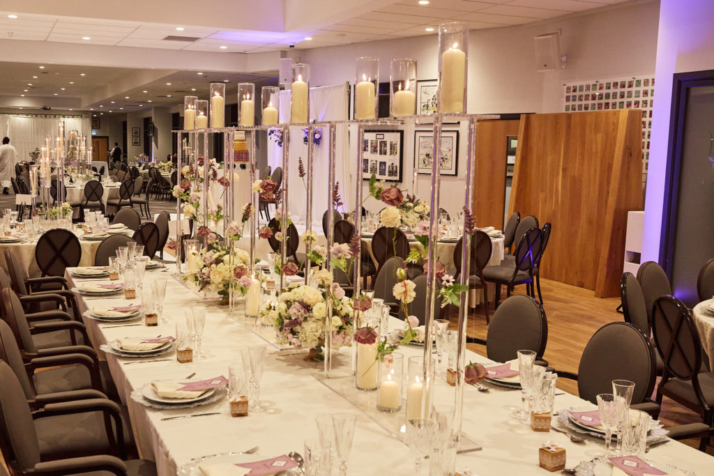 Long banquet tables set for the wedding breakfast